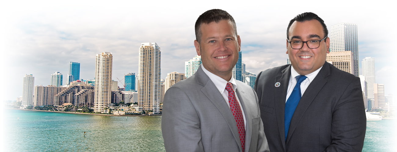Attorney's Photo in front of Miami buildings