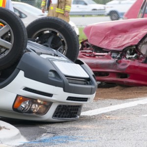 Rollover Vehicle Accident at Busy Intersection With Emergency Pe